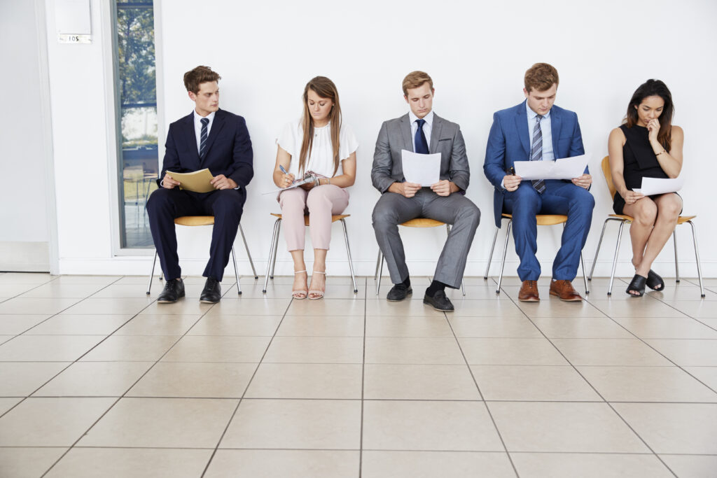 Applicants waiting for their turn for a job interview.
