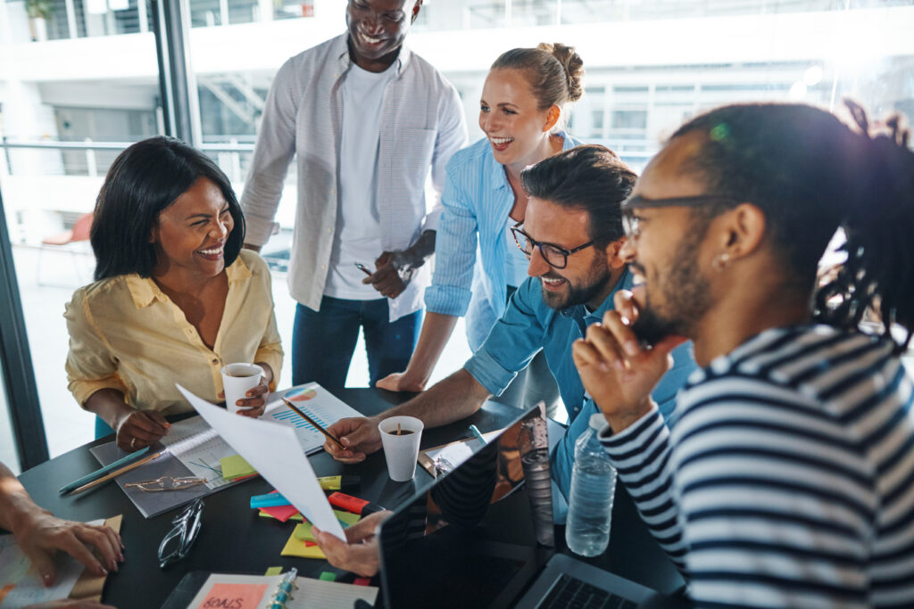 A team collaborating inside a direct marketing company.